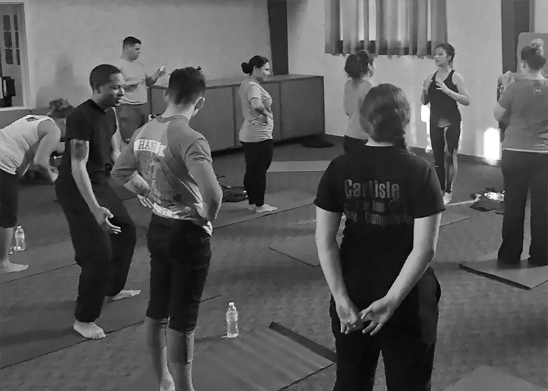 Gentle yoga guest instruction at air force base